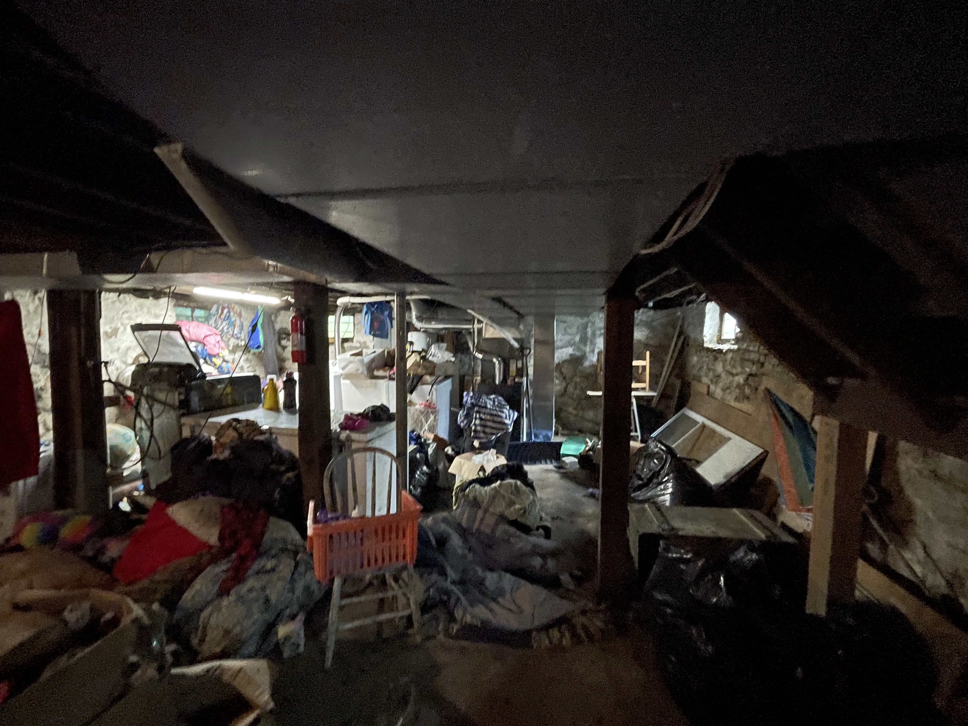 Hoarded basement at 204 E Oakland before renovation