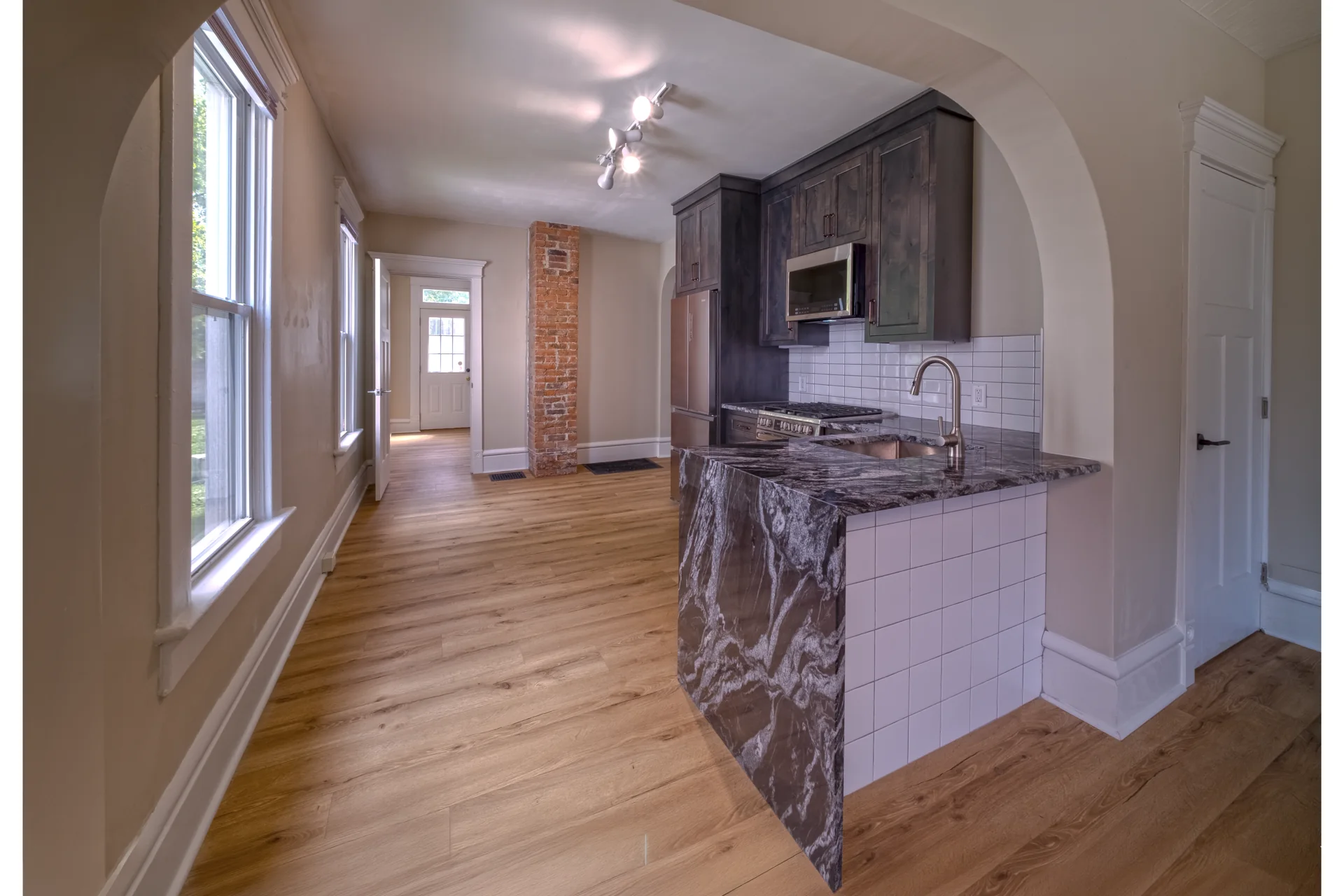 Kitchen island, dishwasher and range at 73 E Patterson